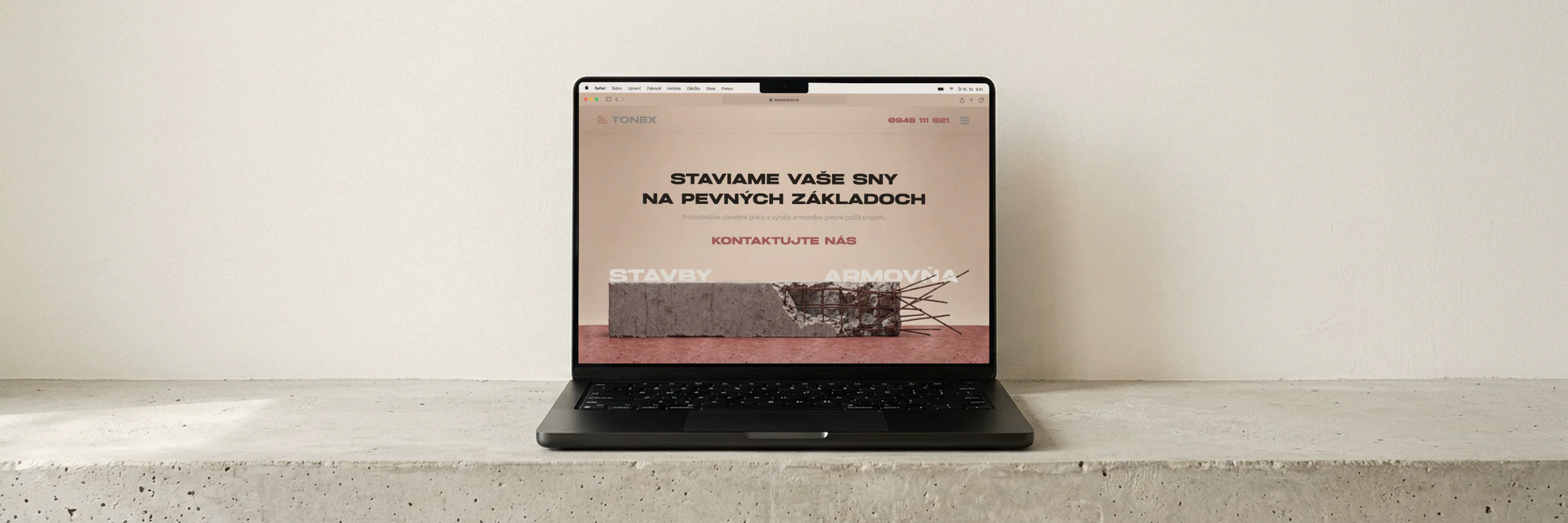 The TONEX stavby website on a laptop
