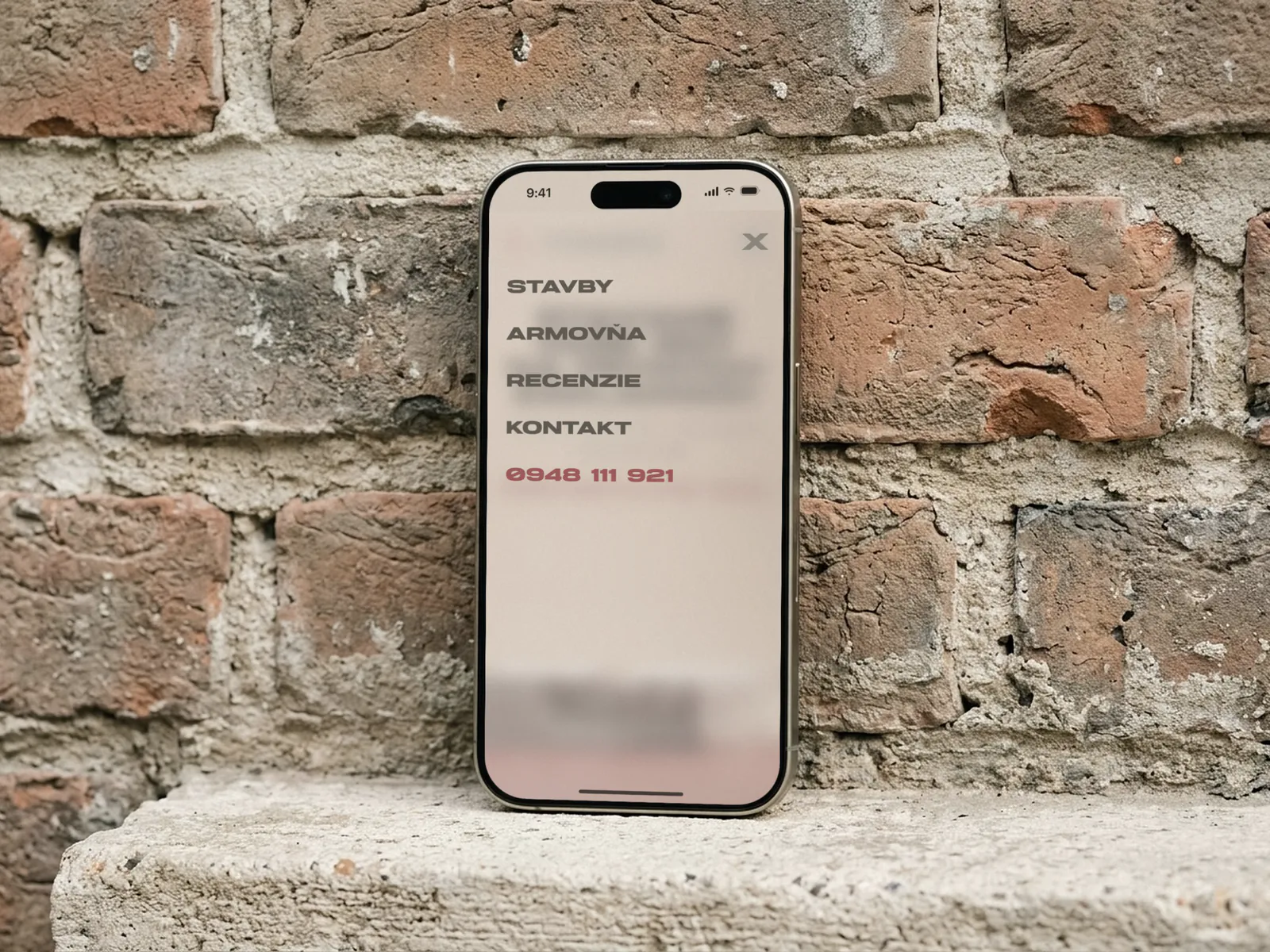 The open menu on a phone, with both divisions and the phone number